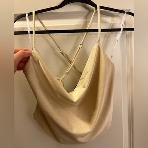 Champagne colored cross back cowl neck crop top